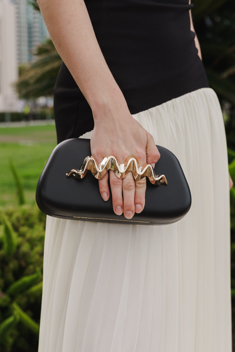 Wavy Metal Handle Faux Leather Clutch Black