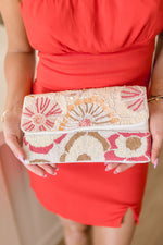 embroidered clutch